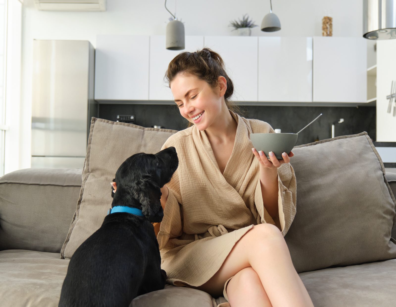 Guest spending time with a pet in a Corporate Keys apartment